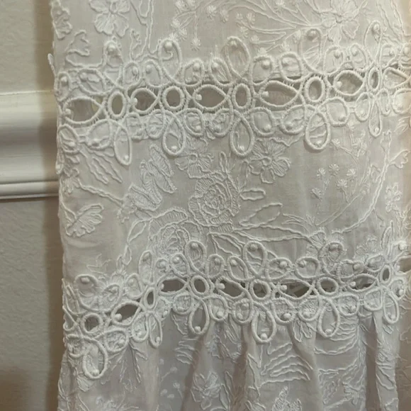 Rafaela D’Angelo. White boho or beach maxi dress.